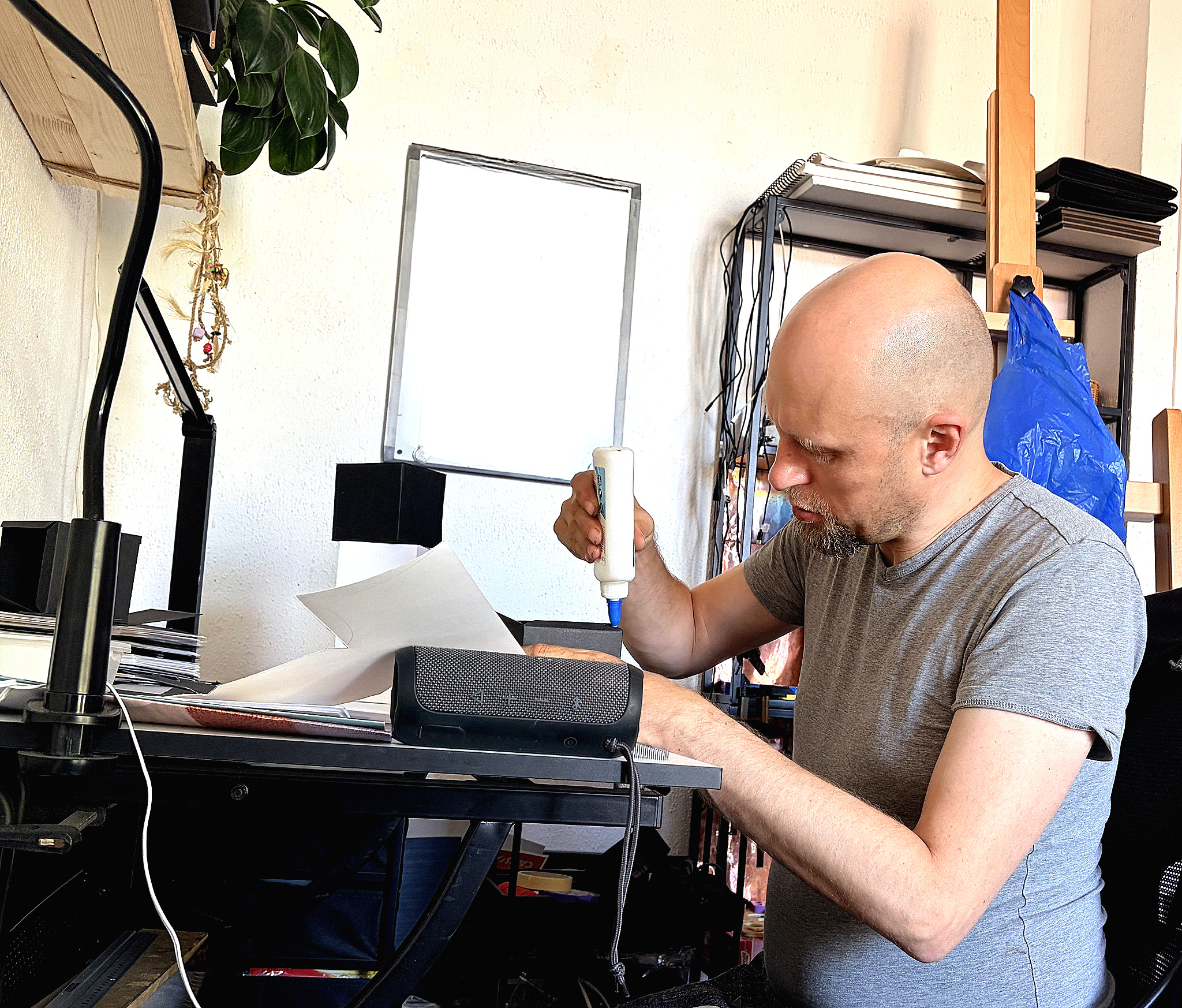 m v baks at work on cubes at his studio